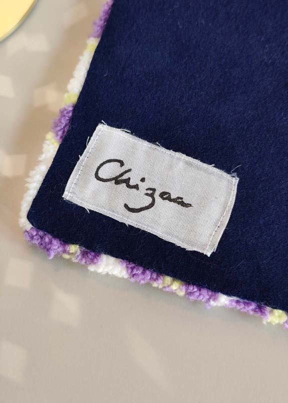 Petit tapis tufté - motif losanges violets