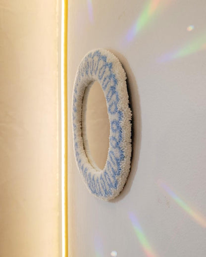 Miroir tufté rond - motif ressort bleu