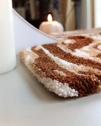 Petit tapis tufté - motif crème